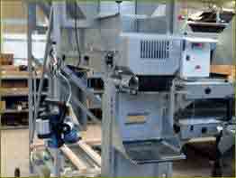 A semi automatic SKALS weighing and bagging machine